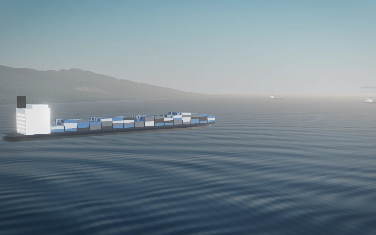 A container vessel approaching the British Columbia coast in morning haze