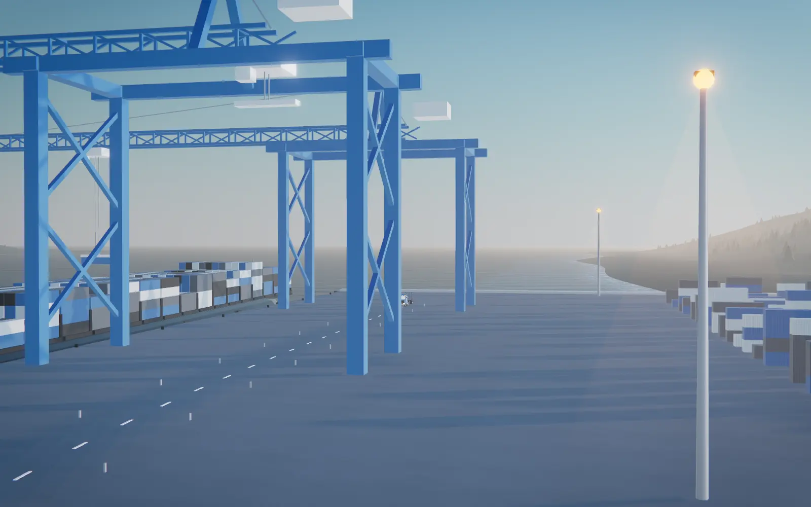 A container being lowered from a gantry crane onto a truck chassis at a Vancouver terminal